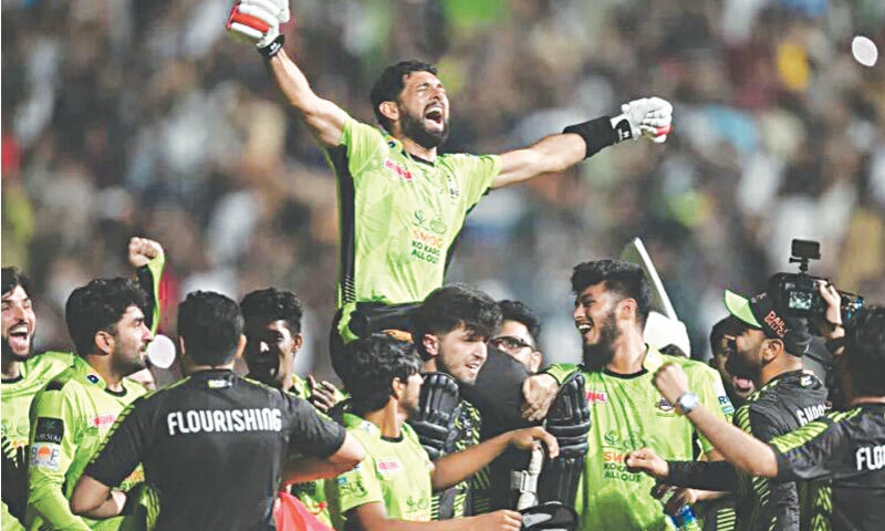 Lahore Qalandars&rsquo; players lift Sikandar Raza on their shoulders as they celebrate beating Quetta Gladiators to win the Pakistan Super League 2025 at the Gaddafi Stadium, Lahore | AFP