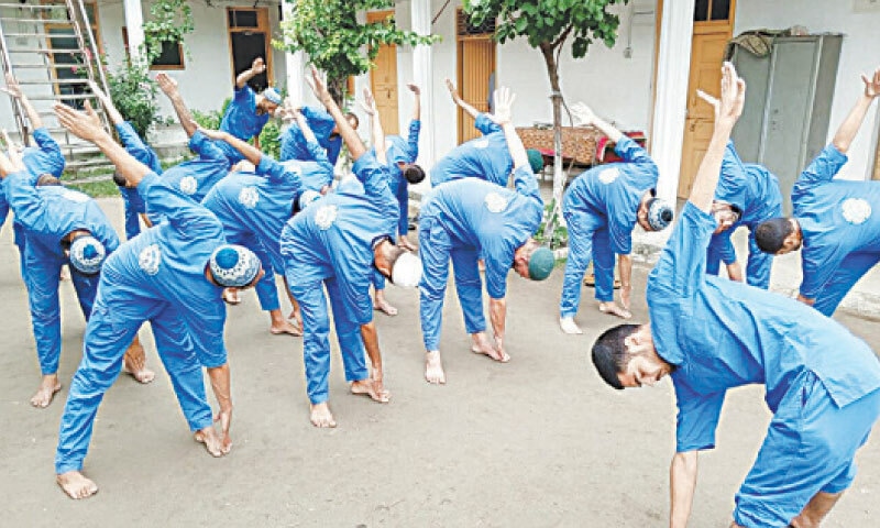 Inmates of the drug rehabilitation centre busy in daily exercises. &mdash; Dawn