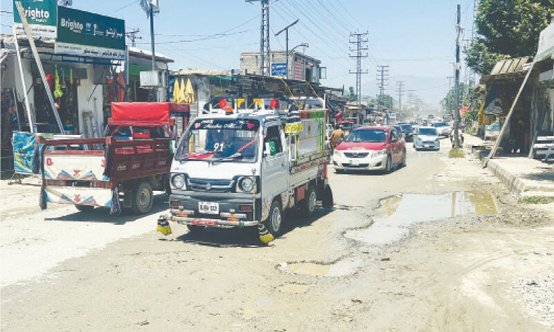 Inayat Kallay-Sadiqabad Road in Bajaur. &mdash; Dawn