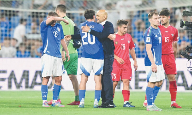 REGGIO EMILIA (Italy): Italy coach Luciano Spalletti hugs Andrea Cambiaso after the World Cup qualifying match against Moldova at the Mapei Stadium.&mdash;Reuters