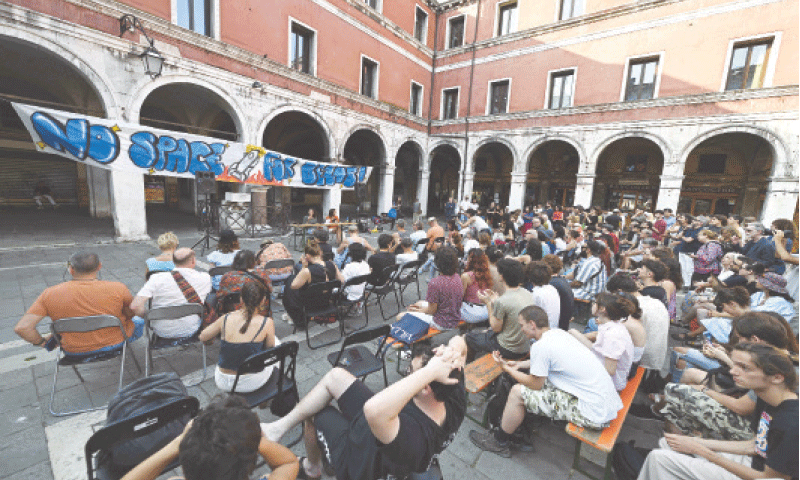 ACTIVISTS gather to protest against the wedding of Amazon founder Jeff Bezos and journalist Lauren Sanchez in Venice.&mdash;AFP