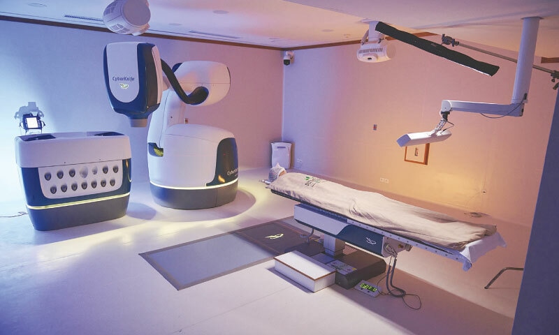 A patient undergoes a procedure at the Cyberknife Robotic Radiology section