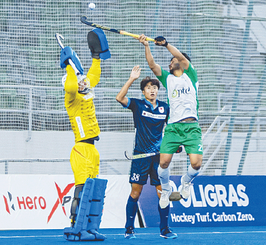 PAKISTAN&rsquo;S Afraz Hakeem (R) in action during the FIH Nations Cup match against Japan at the National Hockey Stadium on Monday.&mdash;courtesy FIH