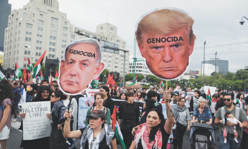 Mexico City: Demonstrators hold up cutouts of Israeli Prime Minister Benjamin Netanyahu and US President Donald Trump during a protest in support of Palestinians, earlier this week.—Reuters