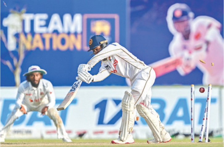  SRI LANKAN opener Pathum Nissanka is clean bowled by Bangladesh pacer Hasan Mahmud during their first Test at the Galle International Cricket Stadium on Thursday.—AFP 