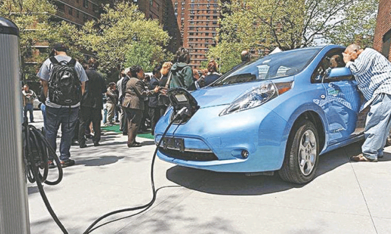 A vehicle is being recharged, highlighting Pakistan’s gradual shift towards cleaner, sustainable transportation.—AFP/file