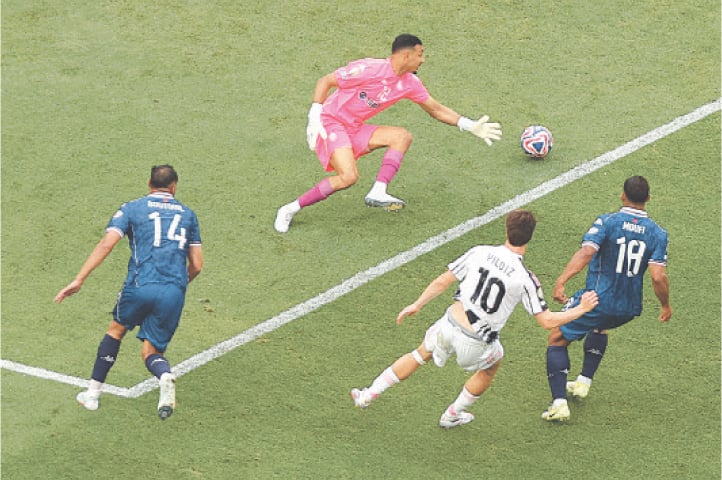PHILADELPHIA: Juventus’ Kenan Yildiz (C) slots the ball past Wydad Casablanca goalkeeper El Mehdi Benabid to score during their Club World Cup Group ‘G’ match at the Lincoln Financial Field on Sunday.—Reuters