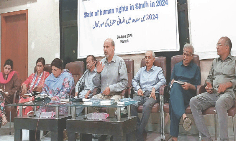 HRCP Sindh Vice Chairman Qazi Khizer highlights key points of the commission’s report at the Karachi Press Club.—Dawn