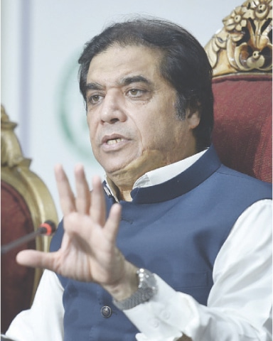  Minister for Railways Hanif Abbasi speaks at a press conference at the National Press Club on Tuesday. — Photo by Tanveer Shahzad 