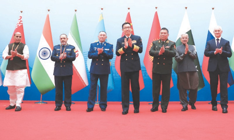 Qingdao: India’s Rajnath Singh, Iran’s Aziz Nasirzadeh, Kazakhstan’s Dauren Kosanov, China’s Dong Jun, Kyrgyzstan’s Ruslan Mukambetov, Pakistan’s Khawaja Asif and Russia’s Andrei Belousov pose for a group photo before the SCO Defence Ministers’ meeting.—AFP