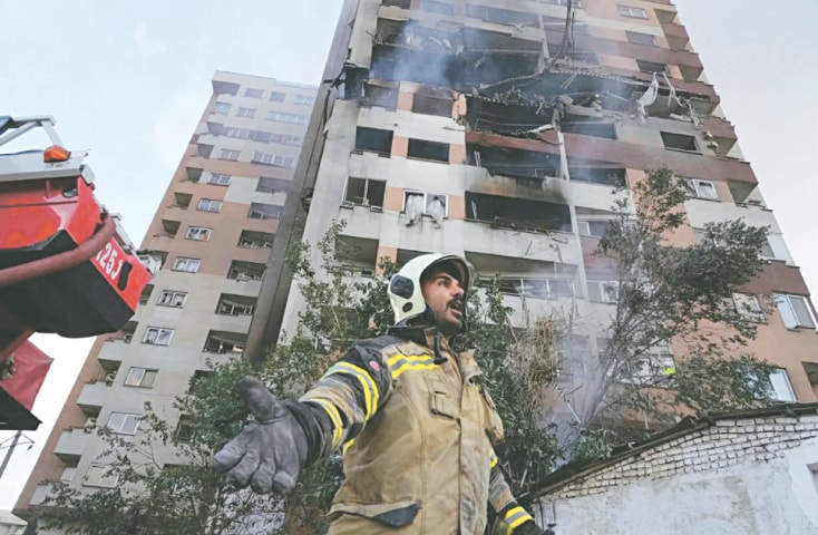  A firefighter calls out to his colleagues after an Israeli attack on a residential compound in Tehran, Iran on June 13, 2025: Trump let Israel attack Iran because he thought that decapitation and degradation would help bring Iran back to the table — instead, Iran walked off, saying it won’t negotiate while being under attack | AP 