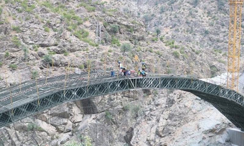 Construction of a centenary box arch bridge in full swing in Louter, Upper Kohistan. &mdash; Photo by Nisar Ahmed Khan