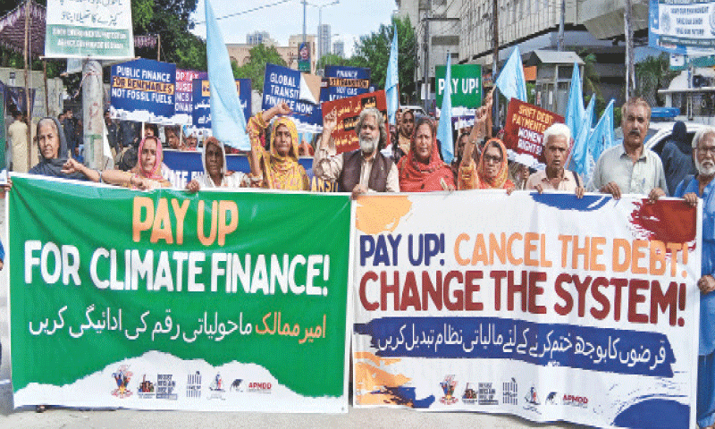 participants of the rally stage a protest in front of the Karachi Press Club.
&mdash;Shakil Adil / White Star