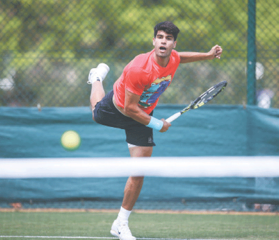 Spain’s Carlos Alcaraz practises ahead of the Wimbledon Championships at The All England Lawn Tennis and Croquet Club on Sunday.—AFP