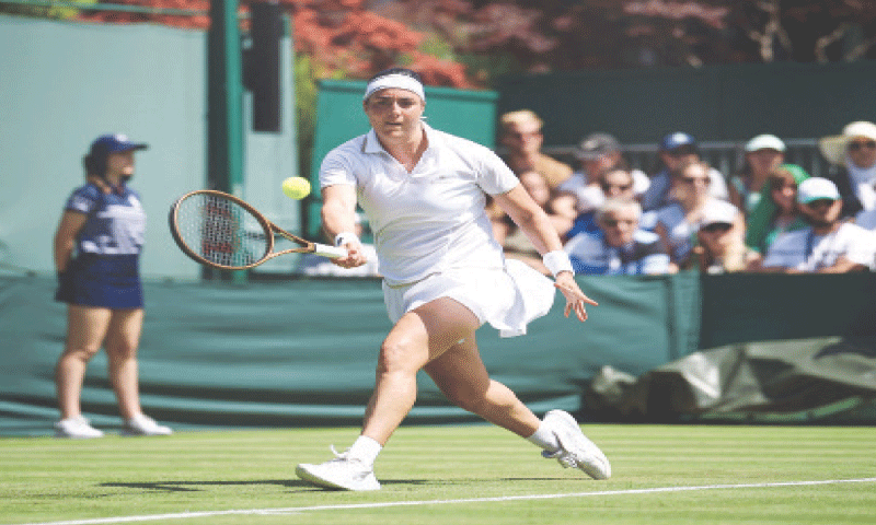  TUNISIA&rsquo;S Ons Jabeur plays a forehand return to Viktoriya Tomova of Bulgaria during their first-round match.&mdash;AFP 