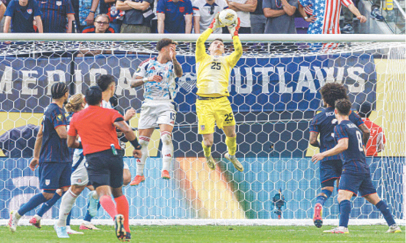 MINNEAPOLIS: US goalkeeper Matt Freese makes a save during the CONCACAF Gold Cup quarter-final against Costa Rica at the US Bank Stadium.&mdash;AFP