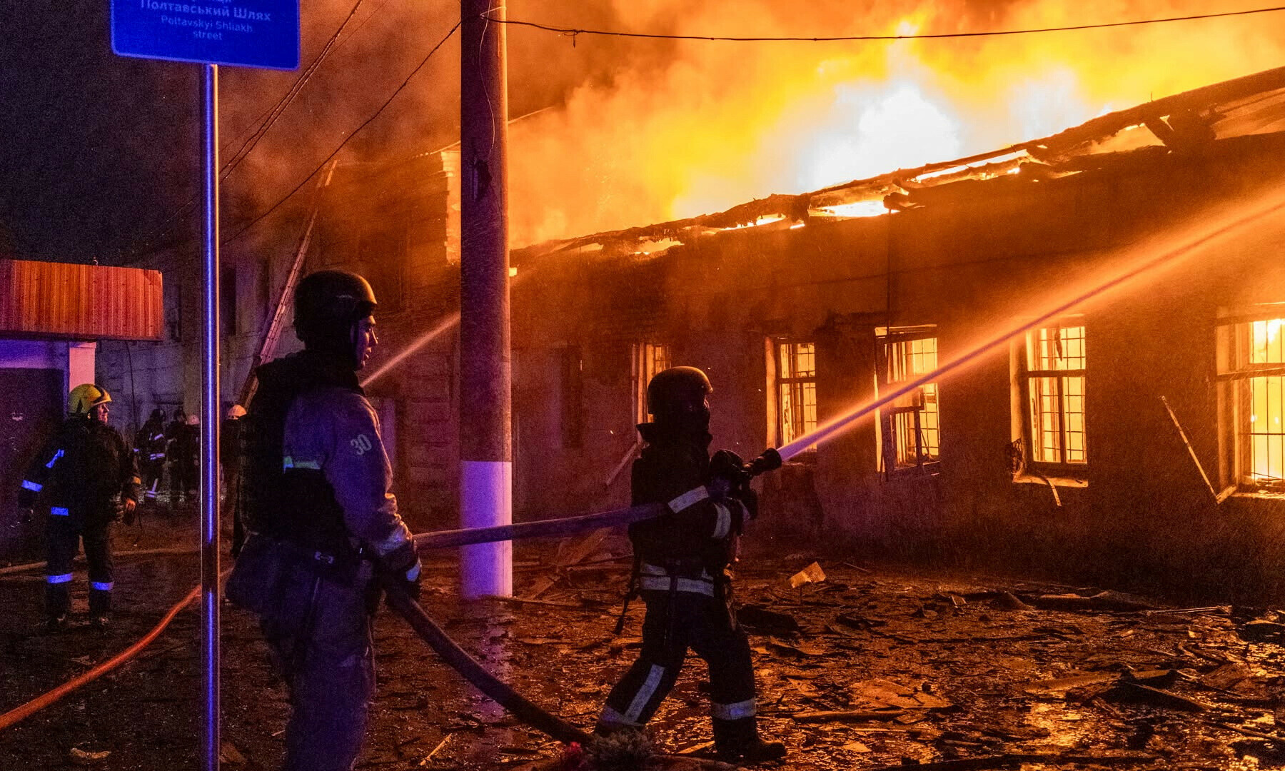 Firefighters work at the site of a building heavily damaged by a Russian drone strike, amid Russia&rsquo;s attack on Ukraine, in Kharkiv, Ukraine, in this handout picture released on July 2, 2025. &mdash; State Emergency Service of Ukraine in Kharkiv region/Handout via Reuters