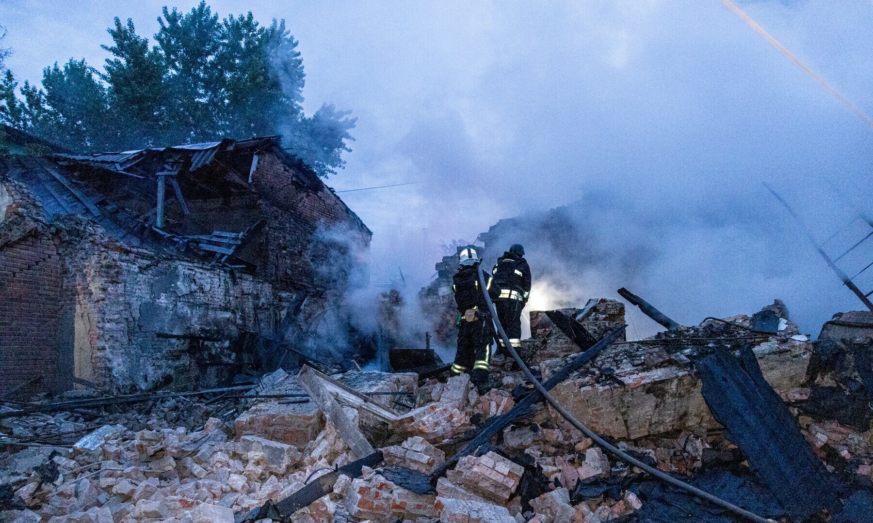  Firefighters work at the site of a building heavily damaged by a Russian drone strike, amid Russia’s attack on Ukraine, in Kharkiv, Ukraine, in this handout picture released on July 2, 2025. — State Emergency Service of Ukraine in Kharkiv region/Handout via Reuters 
