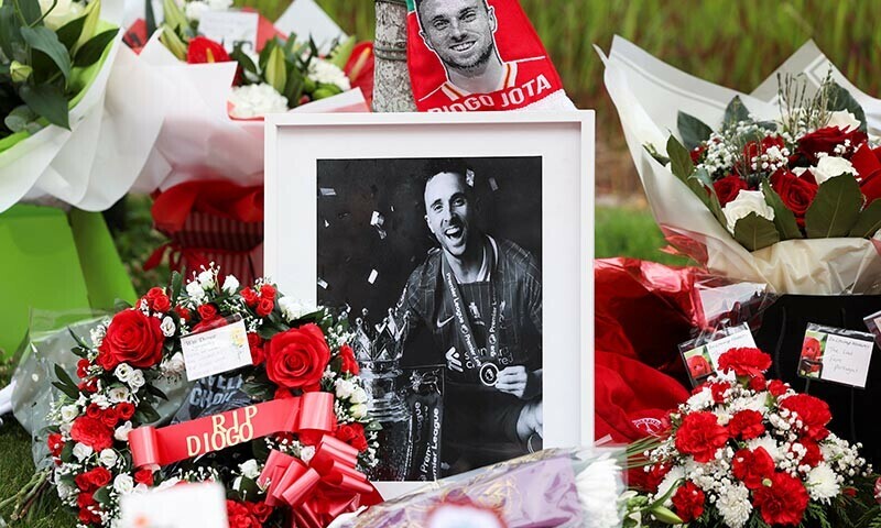 Flower tributes are left outside Liverpool’s Anfield Stadium after Liverpool’s Portuguese soccer player Diogo Jota died in a car crash near Zamora, Spain, in Liverpool, Britain on July 4. — Reuters
