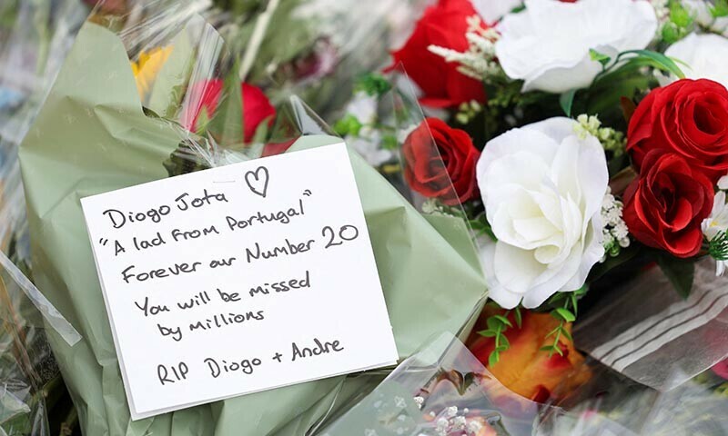Flower tributes are left outside Liverpool’s Anfield Stadium after Liverpool’s Portuguese soccer player Diogo Jota died in a car crash near Zamora, Spain, in Liverpool, Britain, on July 4. — Reuters