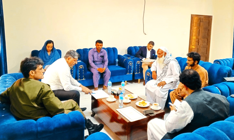 Sahiwal Commissioner Asif Tufail and Regional Police Officer Mahboob Rasheed listen to the grievances of 20 deceased babies&rsquo; parents in Pakpattan on July 3, 2025. &mdash; photo via Shafiq Butt