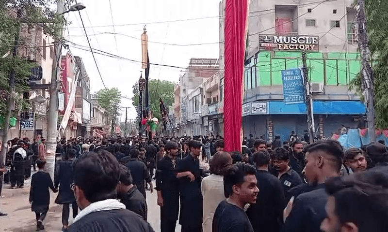 Mourners participate in a Muharram 10 procession in Karachi on July 6. — DawnNews TV