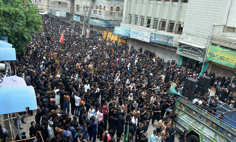 Mourners participate in a Muharram 10 procession in Hyderabad on July 5. — Photo by Umair Ali