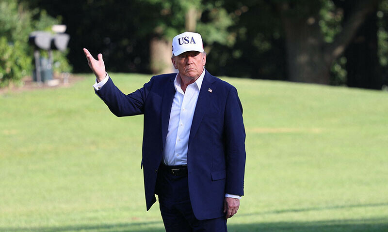 US President Donald Trump gestures as he walks on the South Lawn of the White House in Washington, DC, US, July 6. — AFP