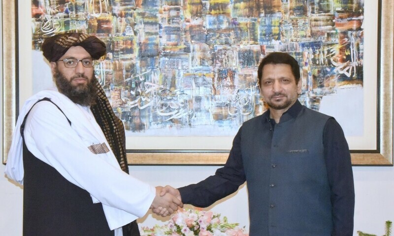 Afghan Additional Foreign Secretary Mufti Noor Ahmad Noor and Additional Foreign Secretary Syed Ali Asad Gilani shake hands after talks in Islamabad, July 7. — Photo via X/@ForeignOfficePk