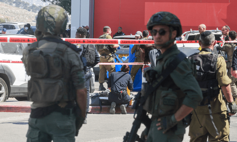  Israeli security personnel stand guard near the scene of a stabbing attack, in Gush Etzion in the Israeli-occupied West Bank on July 10, 2025. &mdash; Reuters 