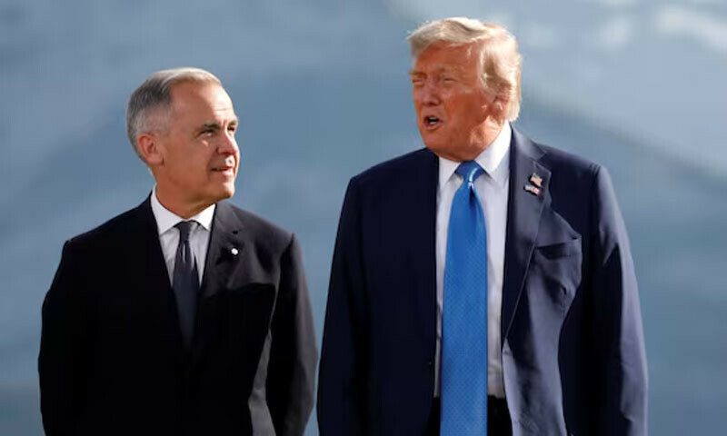 Canada Prime Minister Mark Carney and US President Donald Trump pose for a family photo during the G7 Summit in Kananaskis, Alberta, Canada, June 16, 2025. — Reuters