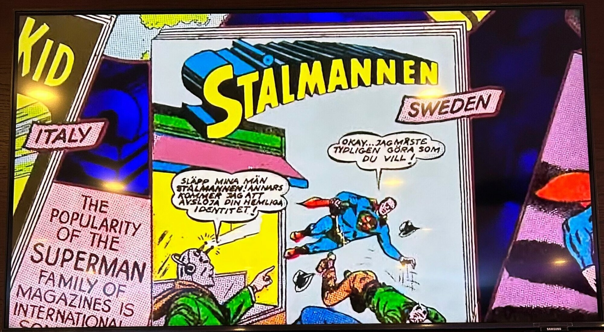  A frame from a video installation at Aamir Sajjad’s exhibit shows a Swedish edition of a Superman comic, titled <em>Stålmannen</em>. Photo: Author 