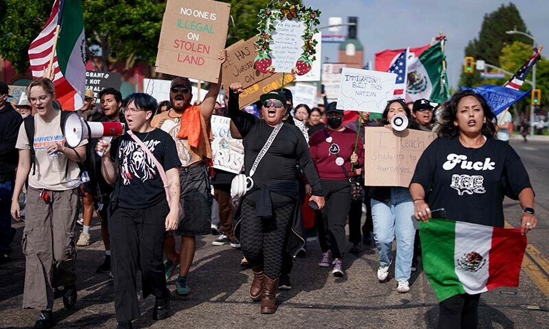 People attend a rally and march on July 11, 2025 in Oxnard, California. — AFP