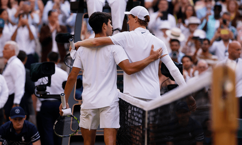 Italy’s Jannik Sinner hugs Spain’s Carlos Alcaraz after winning the men’s final at All England Lawn Tennis and Croquet Club, London, Britain on July 13, 2025. — Reuters
