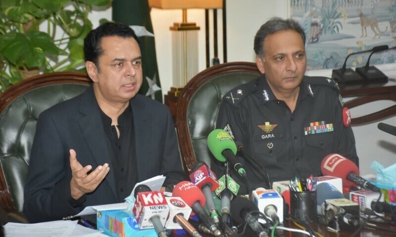 Minister of State for Interior Talal Chaudhry addresses a press conference with Frontier Constabulary Commandant Riaz Nazir Gara in Faisalabad, July 14. — PID