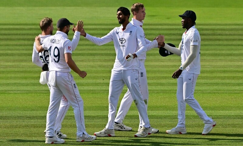England’s Shoaib Bashir (C) celebrates with England’s Chris Woakes and England’s Joe Root (L) as England win the test match on the fifth day of the third cricket test match between England and India at Lord’s cricket ground in London, UK, July 14. — AFP