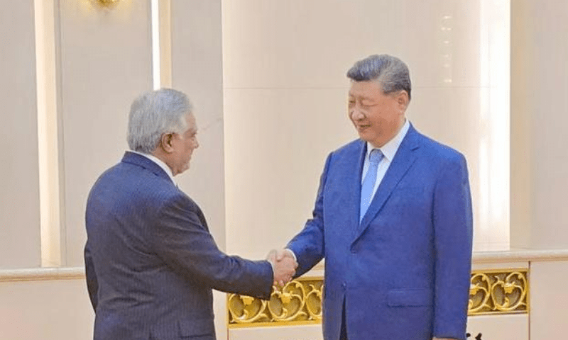 Deputy Prime Minister and Foreign Minister Ishaq Dar shakes hands with Chinese President Xi Jinping ahead of the SCO Council of Foreign Ministers’ meeting, on July 15, 2025. — ForeignOfficePk via X