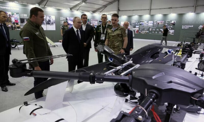 Russian President Vladimir Putin tours a military hardware exhibition organised by the All-Russia People’s Front political movement, in Moscow, Russia, July 6. — Reuters