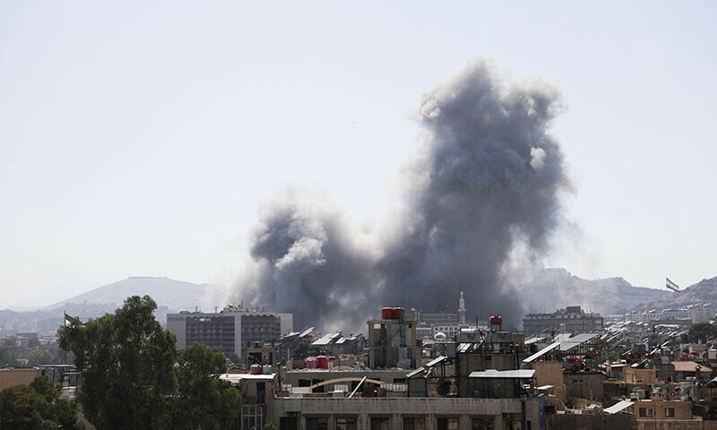 Smoke rises from a building after Israel struck Syria’s defence ministry in Damascus, Syria on July 16. — Reuters