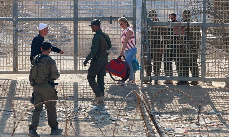People cross the border from Syria to Majdal Shams, near the ceasefire line between the Israeli-occupied Golan Heights and Syria, amid the ongoing conflict in the Druze areas in Syria, in Majdal Shams on July 17, 2025. — Reuters