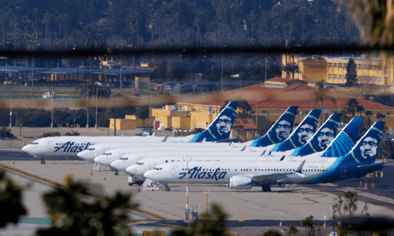 Alaska Airlines commercial airplanes are shown parked off to the side of the airport in San Diego, California, US on January 18, 2024. &mdash; Reuters/File