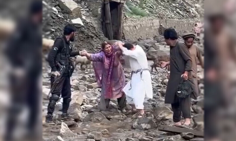 Authorities and local people rescue a tourist amid flooding in GB’s Diamer district. — Photo via Imtiaz Ali Taj Authorities and local people rescue a tourist amid flooding in GB’s Diamer district. — Photo via Imtiaz Ali Taj