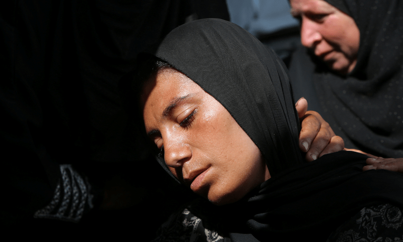 A mourner attends the funeral of Palestinians killed in an early morning Israeli strike on a tent sheltering displaced people, according to medics, at Nasser Hospital in Khan Younis, southern Gaza Strip, on July 21, 2025. &mdash; Reuters
