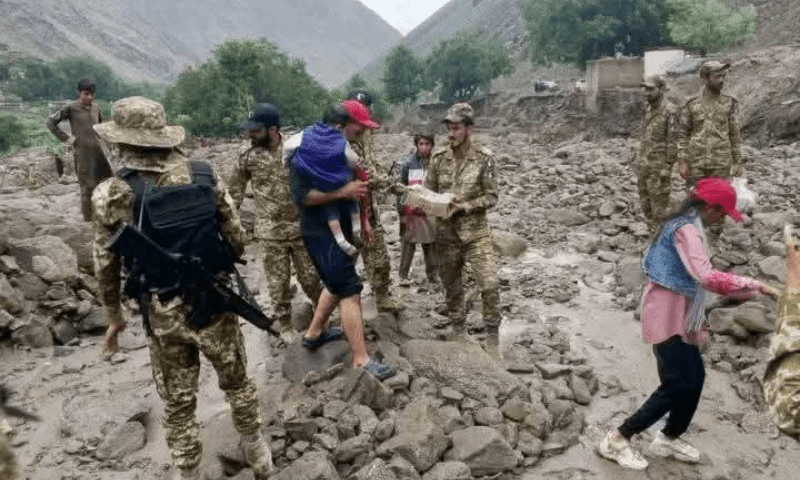 Authorities and local people rescue a tourist amid flooding in Gilgit-Baltistan. — GB govt spokesperson via Imtiaz Ali Taj Authorities and local people rescue a tourist amid flooding in Gilgit-Baltistan. — GB govt spokesperson via Imtiaz Ali Taj