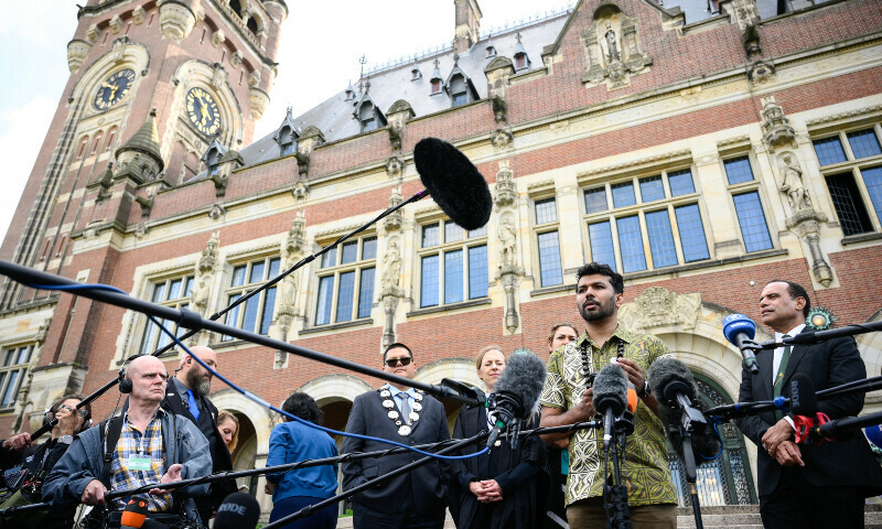 Director of the Pacific Islands Students Fighting Climate Change (PISFCC) youth-led organisation, Vishal Prasad (2nd R), speaks to the media after an International Court of Justice (ICJ) session tasked with issuing the first Advisory Opinion (AO) on states’ legal obligations to address climate change, in The Hague on July 23. — AFP