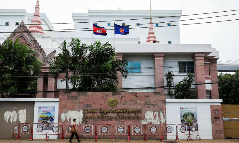 A woman walks past the Royal Embassy of Cambodia, after Thailand recalled its ambassador to Cambodia and said it would expel Cambodia&rsquo;s ambassador, following a landmine incident that injured Thai soldiers and recent clashes along the disputed border between the two countries, in Bangkok, Thailand, on July 24, 2025. &mdash; Reuters/Chalinee Thirasupa
