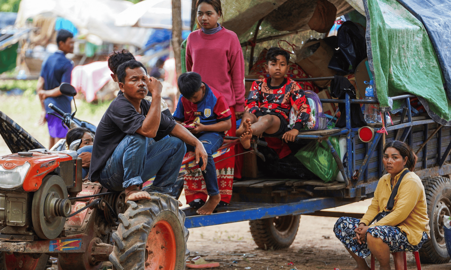 People, evacuating from Pong Tuek village, in Banthey Empel district, around 20 kilometres from the disputed Ta Moan Thom temple, rest at a temporary shelter, after Thailand scrambled an F-16 fighter jet to bomb targets in Cambodia following artillery volleys from both sides that killed civilians, in Oddar Meachey province, Cambodia on July 25. &mdash; Reuters