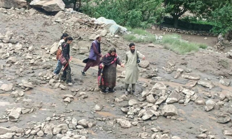 Rescue personnel engaged in rescue operation as landslides and floods trigged by heavy rain continue across GB. &mdash; Photo by Imtiaz Ali Taj