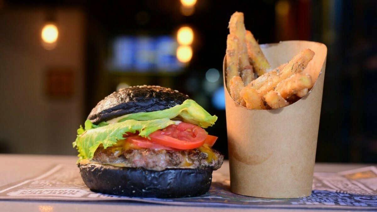 Islamabad's Street Burger serves beef patties in a black bun. Would you try it?