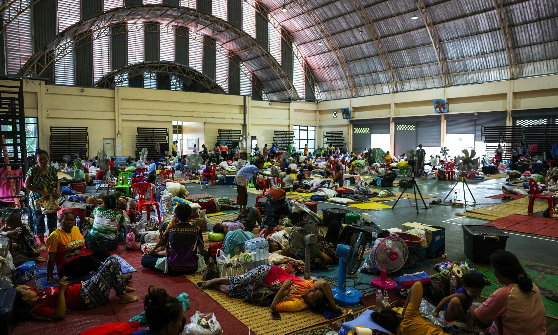 People rest inside a shelter in Surin, Thailand on July 25, 2025 after Thailand and Cambodia exchanged heavy artillery on Friday as their worst fighting in more than a decade stretched for a second day. &mdash; Reuters/Athit Perawongmetha
